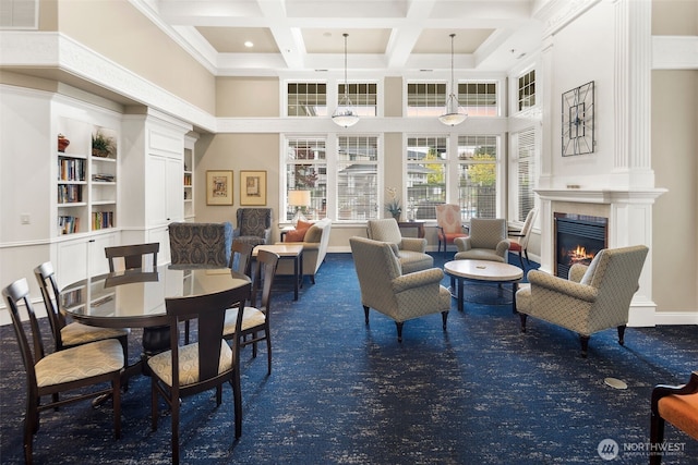 2220 132nd Ave SE Unit A220, Bellevue, WA 98005 - dining room featuring a towering ceiling, carpet floors, a large fireplace, coffered ceiling, and beamed ceiling