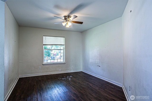 20007 17th Ave E, Spanaway, WA 98387 - spare room featuring wood finished floors, a ceiling fan, and baseboards