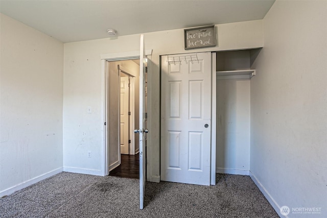 20007 17th Ave E, Spanaway, WA 98387 - unfurnished bedroom with carpet floors, baseboards, and a closet