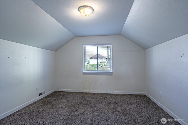 20007 17th Ave E, Spanaway, WA 98387 - bonus room with carpet flooring, vaulted ceiling, and baseboards