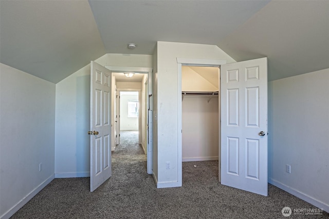 20007 17th Ave E, Spanaway, WA 98387 - unfurnished bedroom with lofted ceiling, carpet flooring, a closet, and baseboards