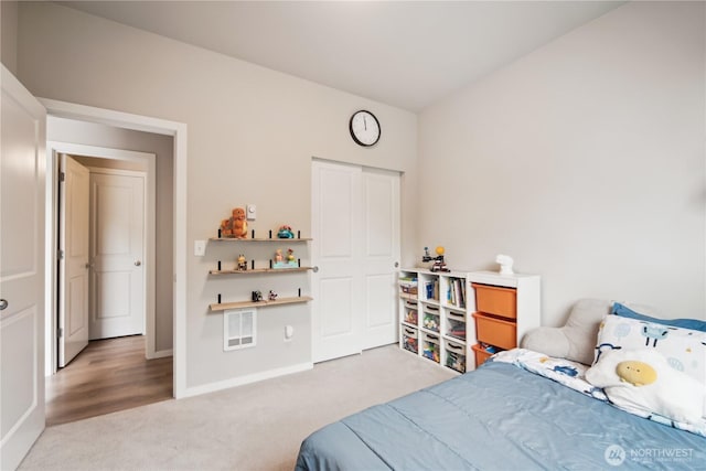 4305 23rd Ct NE, Olympia, WA 98516 - carpeted bedroom with baseboards and a closet