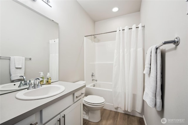 4305 23rd Ct NE, Olympia, WA 98516 - bathroom featuring vanity, toilet, shower / tub combo with curtain, wood finished floors, and recessed lighting
