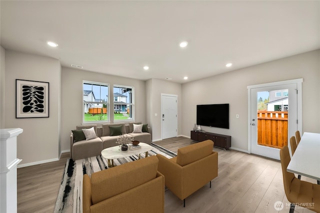 14830 203rd Ave E Unit 684, Bonney Lake, WA 98391 - living area featuring light wood-style floors, recessed lighting, and baseboards