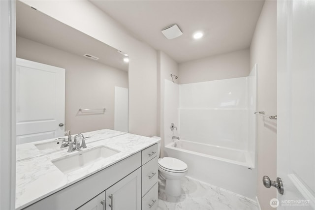 14830 203rd Ave E Unit 684, Bonney Lake, WA 98391 - full bathroom featuring vanity, marble look tiles, toilet, shower / washtub combination, and recessed lighting