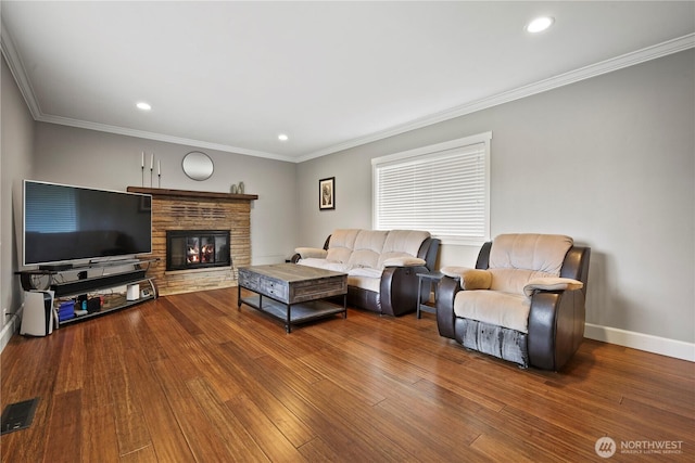 11012 36th St E, Edgewood, WA 98372 - living room with wood finished floors, crown molding, recessed lighting, and a fireplace