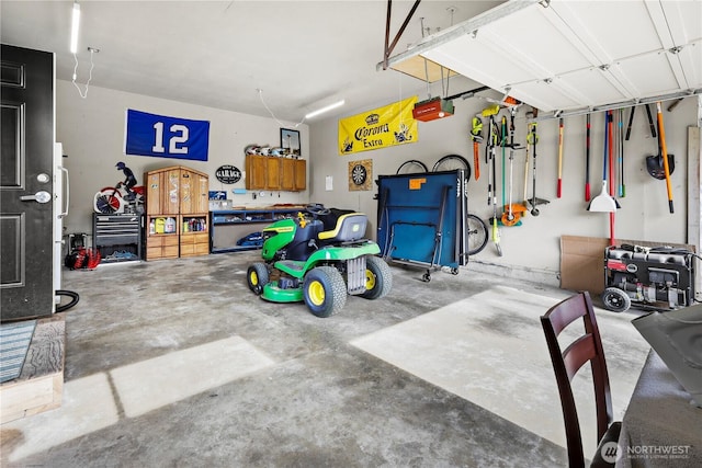 11012 36th St E, Edgewood, WA 98372 - garage featuring a garage door opener