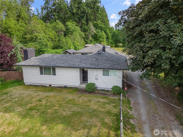 11012 36th St E, Edgewood, WA 98372 - ranch-style home with a chimney, roof with shingles, and dirt driveway