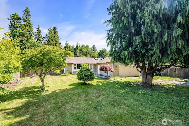 2779 Maple Tree Ln, Camano Island, WA 98282 - view of yard featuring an attached garage and driveway