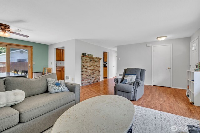 2779 Maple Tree Ln, Camano Island, WA 98282 - living area featuring ceiling fan and light wood finished floors