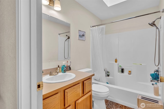 2779 Maple Tree Ln, Camano Island, WA 98282 - full bath with toilet, vanity, shower / bath combination with curtain, a skylight, and tile patterned flooring