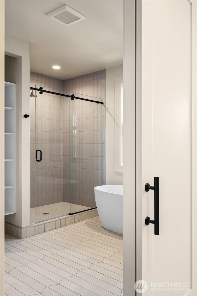 1831 4th St Unit B, Kirkland, WA 98033 - full bathroom featuring a shower stall and a freestanding tub