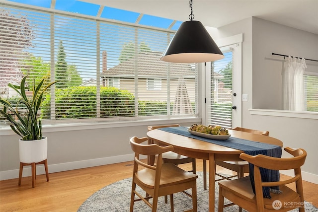 4624 SW 329th Way, Federal Way, WA 98023 - dining area featuring baseboards and light wood finished floors