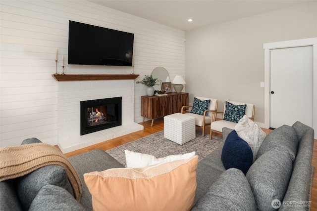 4624 SW 329th Way, Federal Way, WA 98023 - living room with a brick fireplace, wood finished floors, recessed lighting, and wood walls