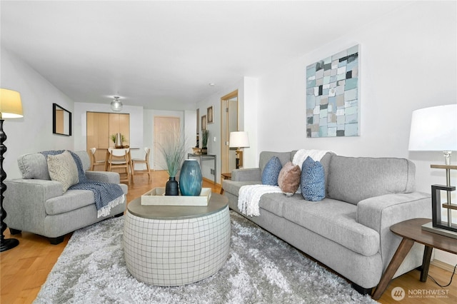 6970 California Ave SW Unit B304, Seattle, WA 98136 - living area with wood finished floors