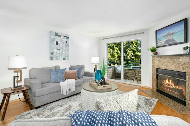 6970 California Ave SW Unit B304, Seattle, WA 98136 - living room featuring a high end fireplace
