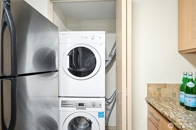 6970 California Ave SW Unit B304, Seattle, WA 98136 - laundry area with stacked washing machine and dryer