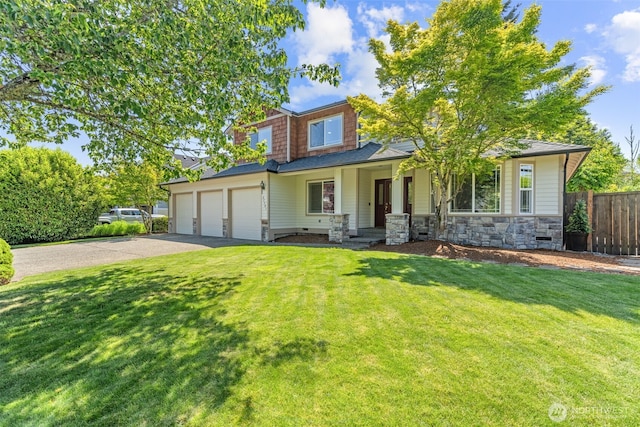 27701 NE 145th Pl, Duvall, WA 98019 - craftsman inspired home with asphalt driveway, stone siding, a garage, and covered porch