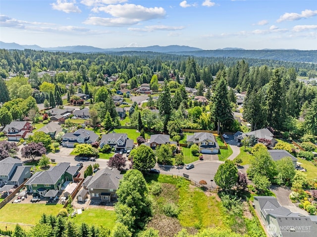 27701 NE 145th Pl, Duvall, WA 98019 - aerial perspective of suburban area featuring a mountainous background