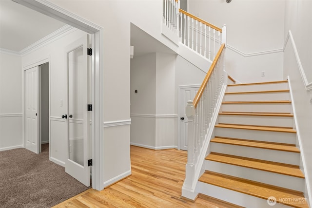 27701 NE 145th Pl, Duvall, WA 98019 - stairs featuring ornamental molding and wood finished floors