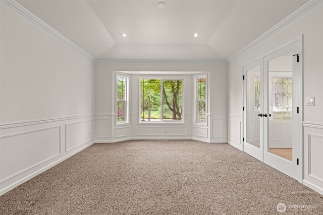 27701 NE 145th Pl, Duvall, WA 98019 - empty room featuring a decorative wall, carpet flooring, french doors, ornamental molding, and wainscoting
