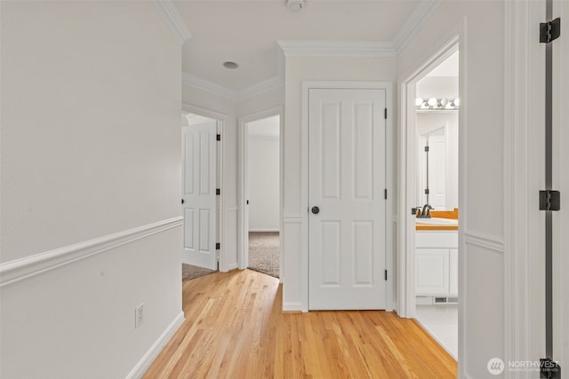 27701 NE 145th Pl, Duvall, WA 98019 - hallway featuring light wood-type flooring and crown molding