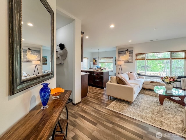 2744 S 120th Pl, Seattle, WA 98168 - living area with wood finished floors and recessed lighting