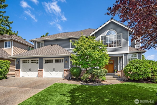 23976 SE 40th Pl, Sammamish, WA 98029 - view of front of house with an attached garage, driveway, a front yard, brick siding, and a shingled roof