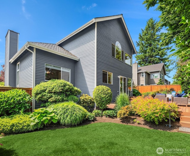 23976 SE 40th Pl, Sammamish, WA 98029 - view of property exterior with a wooden deck and a chimney