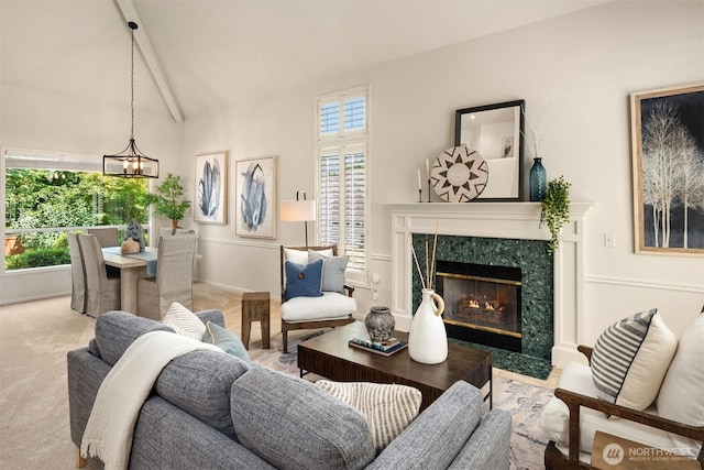 23976 SE 40th Pl, Sammamish, WA 98029 - living room with beam ceiling, a fireplace, and high vaulted ceiling