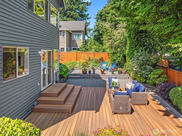 23976 SE 40th Pl, Sammamish, WA 98029 - wooden deck with outdoor lounge area and a fenced backyard