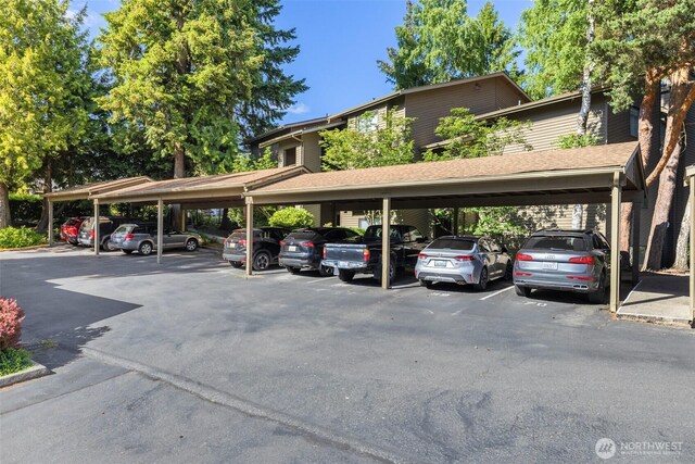 130 SW 116th St Unit F32, Seattle, WA 98146 - view of covered parking lot