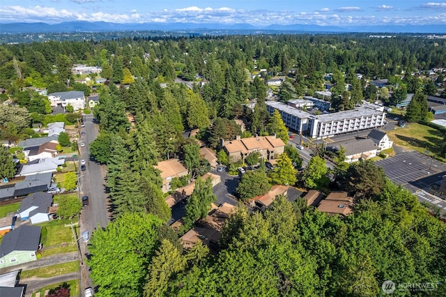 130 SW 116th St Unit F32, Seattle, WA 98146 - aerial view of property and surrounding area with a heavily wooded area