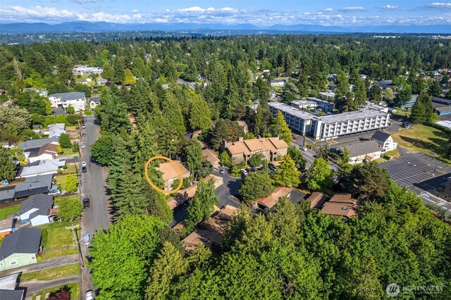 130 SW 116th St Unit F32, Seattle, WA 98146 - aerial view of property's location with a heavily wooded area