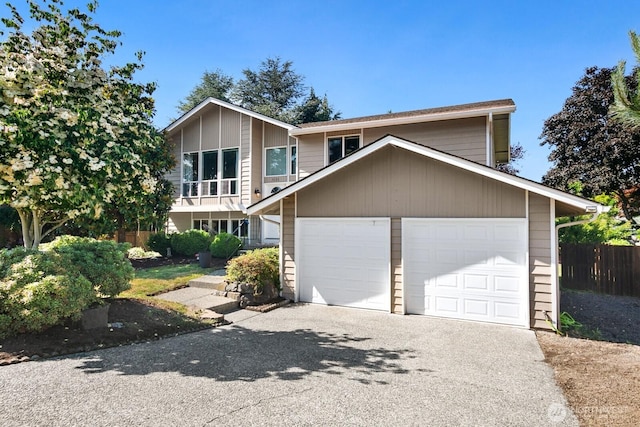 4206 SE 1st Pl, Renton, WA 98059 - view of front of house featuring asphalt driveway and a garage