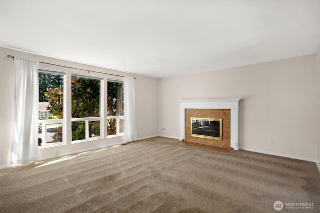 4206 SE 1st Pl, Renton, WA 98059 - unfurnished living room featuring carpet, a fireplace, and baseboards