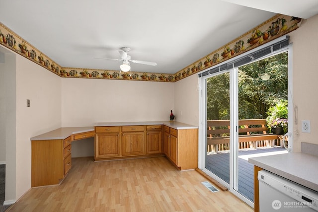 4206 SE 1st Pl, Renton, WA 98059 - unfurnished office with light wood-style flooring, built in desk, and ceiling fan