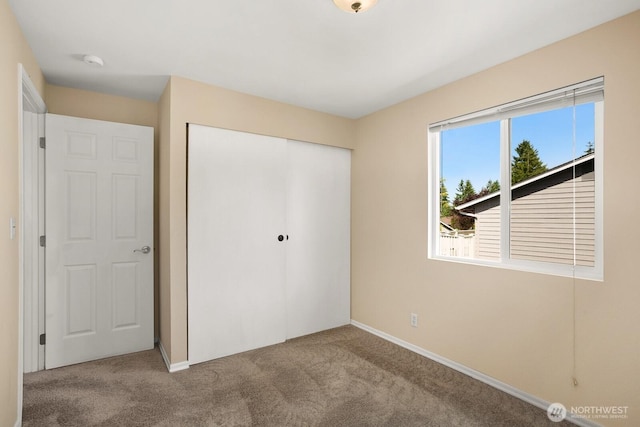 4206 SE 1st Pl, Renton, WA 98059 - unfurnished bedroom with carpet, a closet, and baseboards