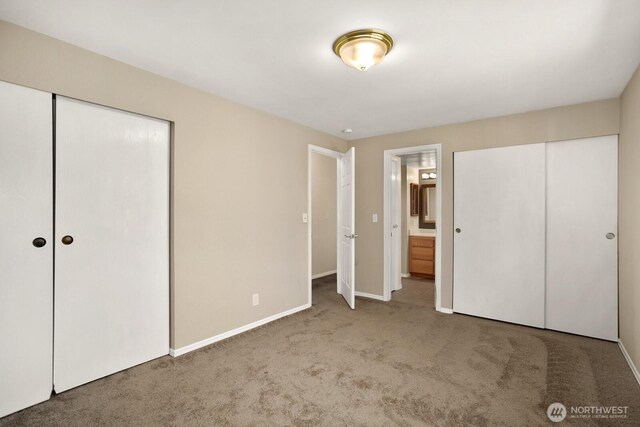 4206 SE 1st Pl, Renton, WA 98059 - unfurnished bedroom featuring carpet floors, baseboards, and ensuite bathroom