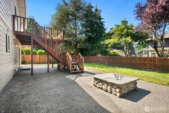 4206 SE 1st Pl, Renton, WA 98059 - view of patio / terrace with a fire pit, stairway, and a deck