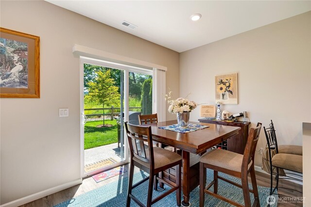 8713 E Gilman Ave, Arlington, WA 98223 - dining room with baseboards, wood finished floors, and recessed lighting