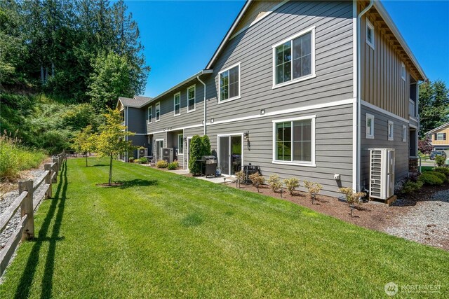 8713 E Gilman Ave, Arlington, WA 98223 - back of property featuring a yard and a patio area