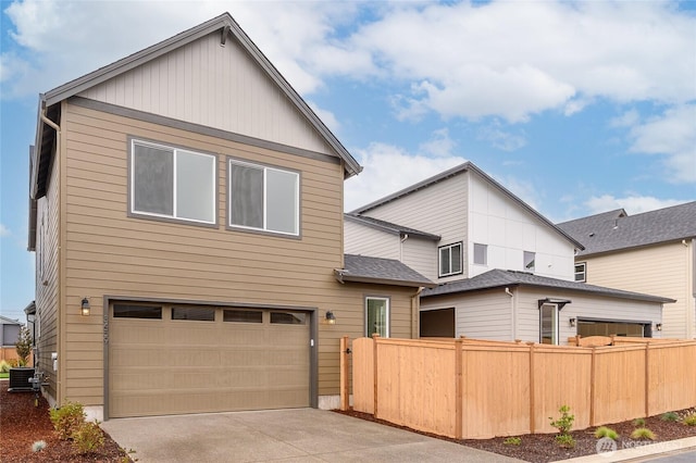 14516 204th Ave E Unit 895, Bonney Lake, WA 98391 - view of front of house featuring an attached garage, driveway, and central air condition unit