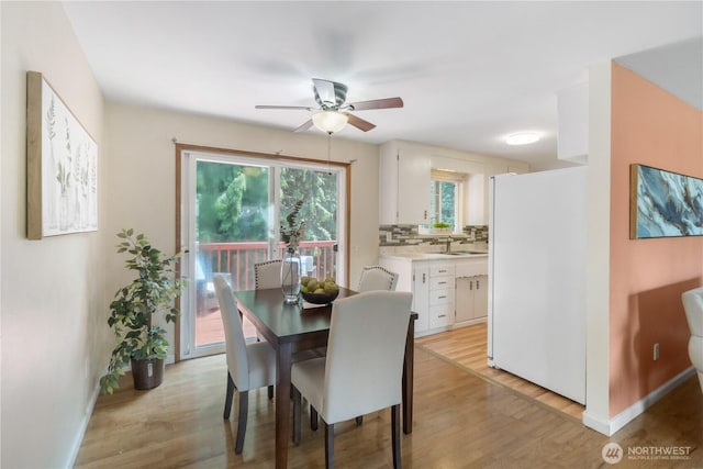 29356 38th Pl S, Auburn, WA 98001 - dining space featuring a ceiling fan and light wood-style flooring