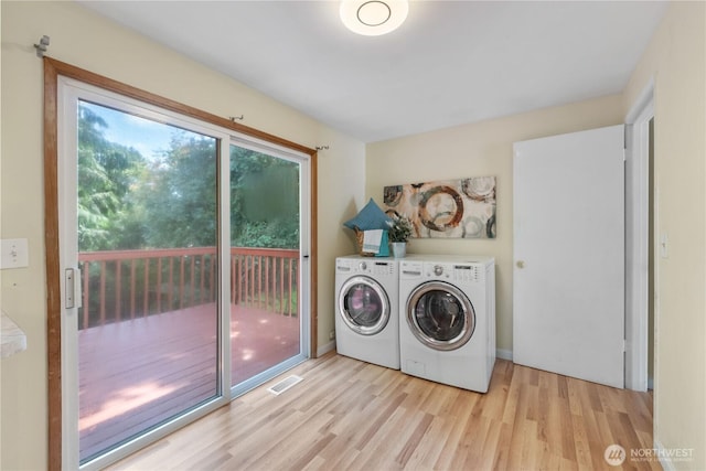 29356 38th Pl S, Auburn, WA 98001 - laundry room featuring separate washer and dryer and light wood-style floors