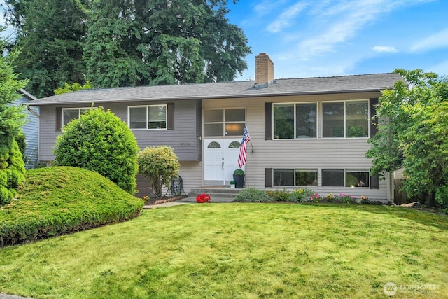 15226 116th Pl NE, Kirkland, WA 98034 - split foyer home with a front yard and a chimney