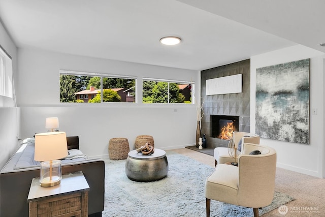 15226 116th Pl NE, Kirkland, WA 98034 - carpeted living area with baseboards and a tiled fireplace
