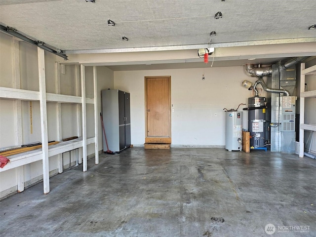 1404 102nd St E, Tacoma, WA 98445 - garage featuring gas water heater and secured water heater