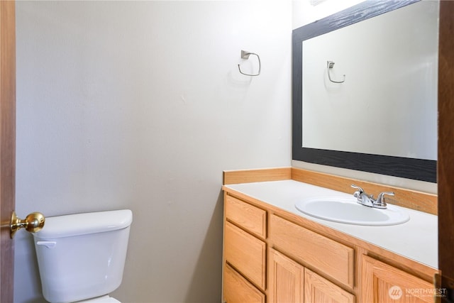 1404 102nd St E, Tacoma, WA 98445 - half bathroom featuring toilet and vanity