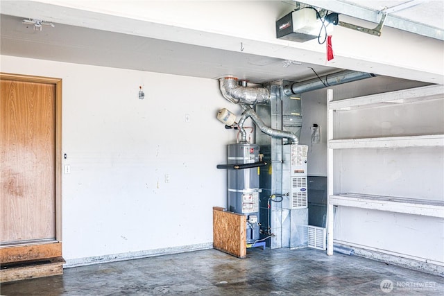 1404 102nd St E, Tacoma, WA 98445 - garage featuring strapped water heater and a garage door opener